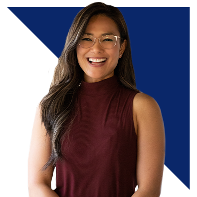 Women in a red tank top and clear glasses