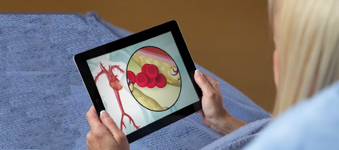 Patient looking at health education on a table