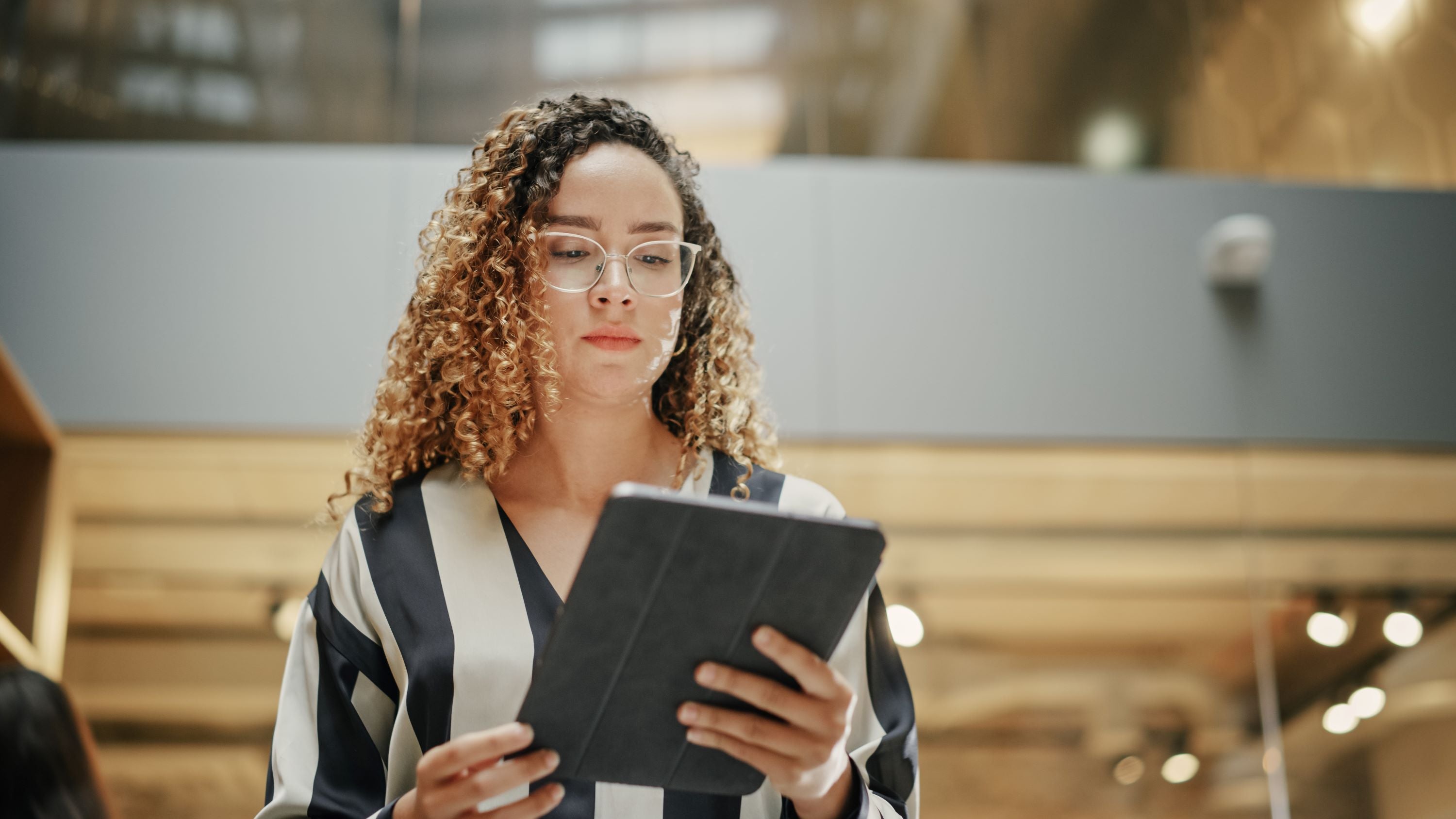 Healthcare marketer on tablet