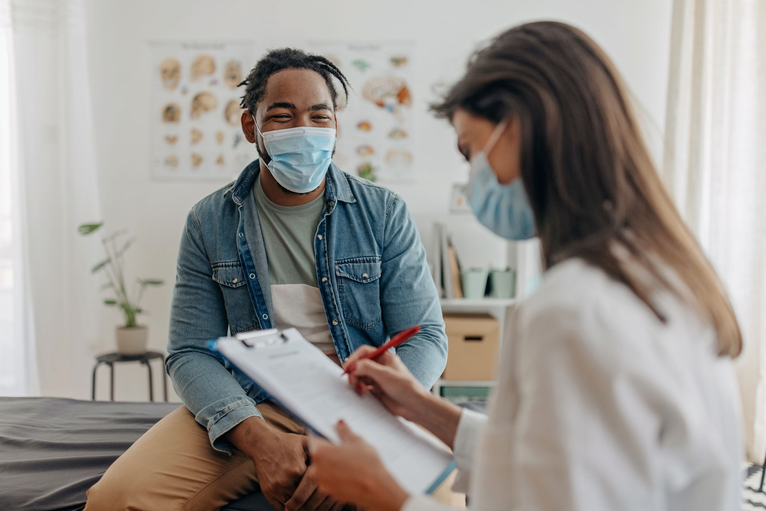 Female doctor seeing patient in office
