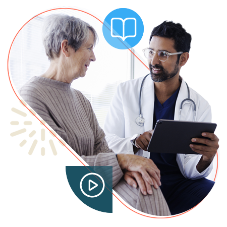 Doctor showing information on a tablet to a patient