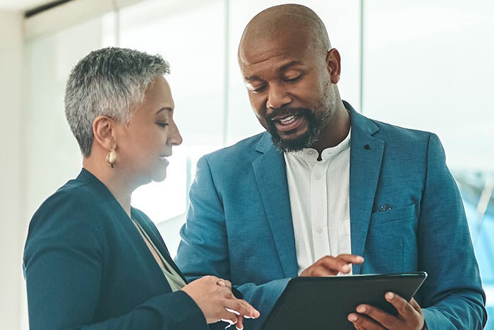 Two marketers discussing data