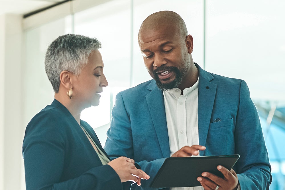Two marketers discussing data