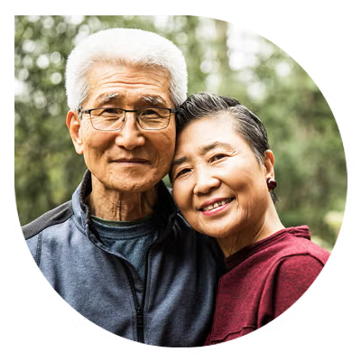 Older couple smiling at camera