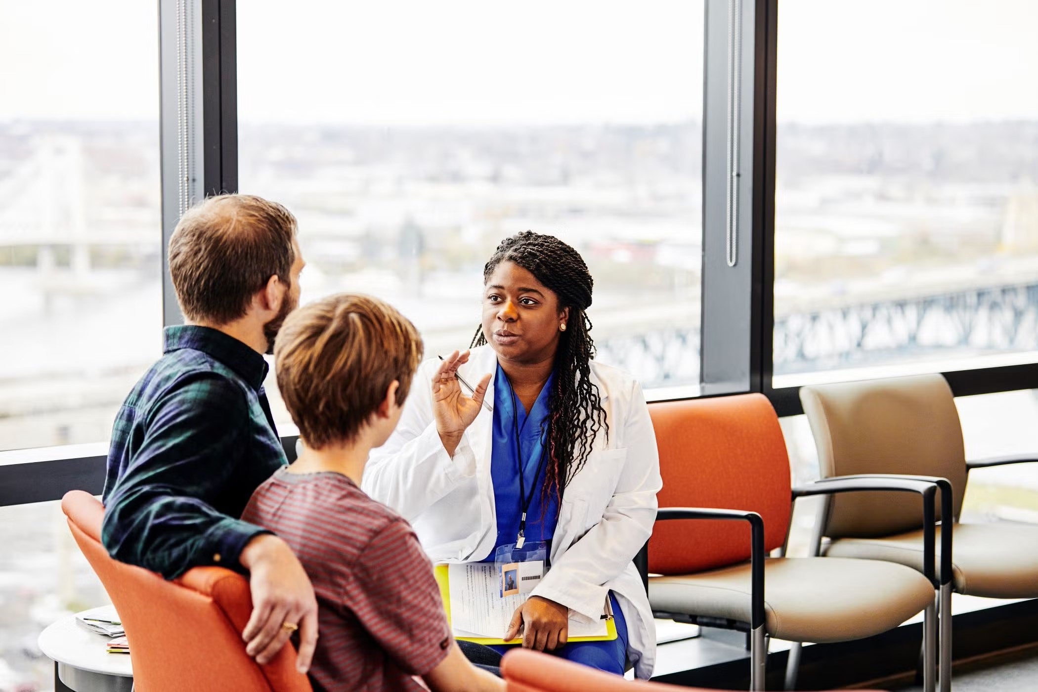 Nurse talking with couple