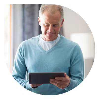Man looking at ipad