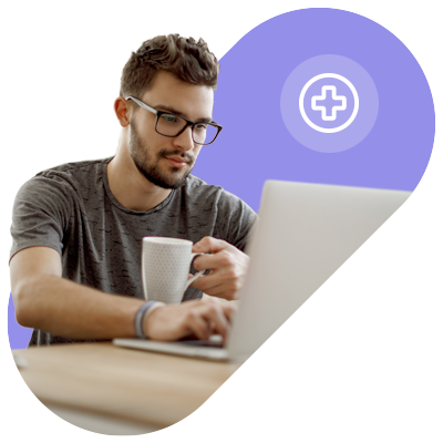 Man reading article on laptop
