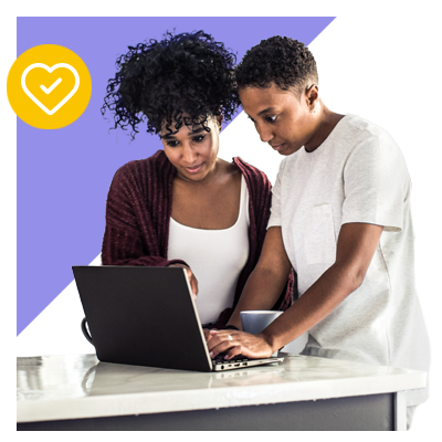 Couple using laptop
