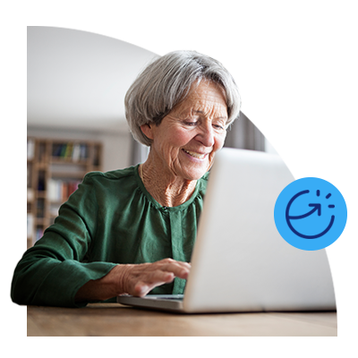 Older lady on laptop smiling